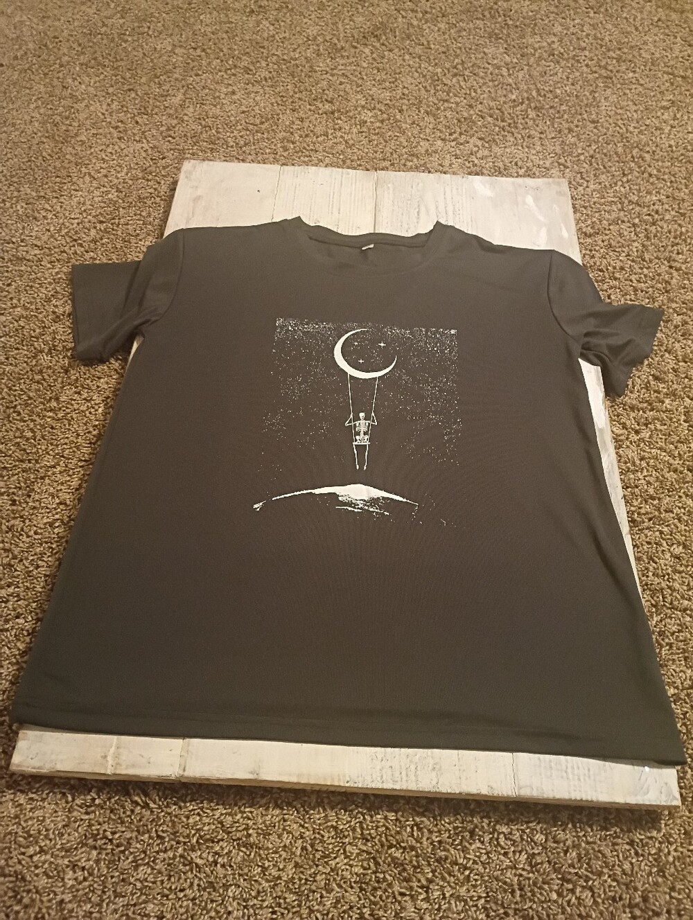 Skeleton riding swing t-shirt graphic tee
